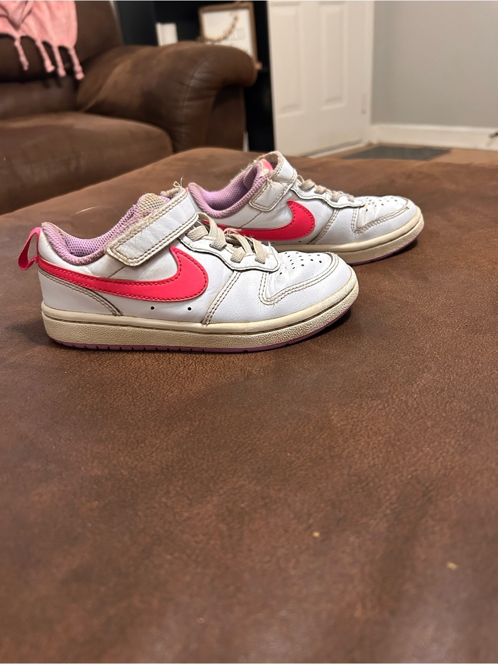 Nike Kids White Sneakers with Pink Swoosh and Pink Accents